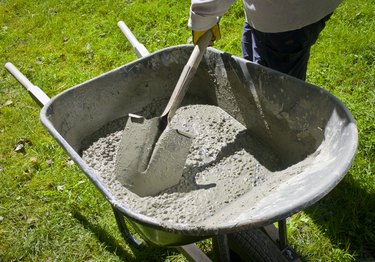 Mixing Cement by Hand in a Wheelbarrow.