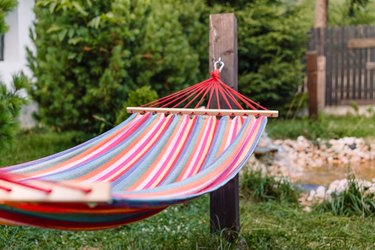 Close-Up Of Hammock Against Trees In Yard