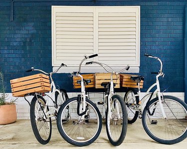 Parked Pushbikes with Box Baskets