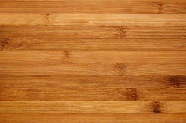 Bamboo brown wood texture, horizontal plank, top view, closeup.