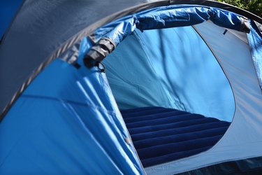 Tent With Air Mattress Set Up at a Campsite Outdoors