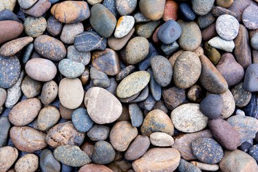 Pebbles background.Gravel background.Colorful pebbles background