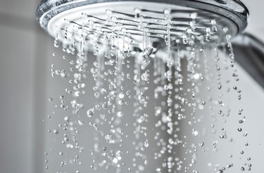 Water jet from a shower head in the bathroom