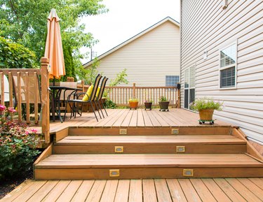 Modern wooden patio and garden area of a family house