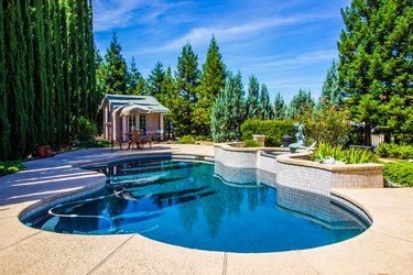 Tranquil Rear Yard Setting With Swimming Pool