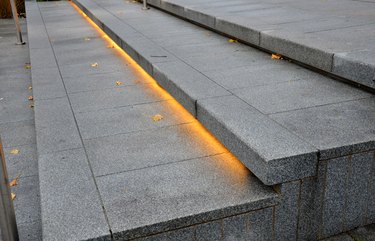 stairs on the square or on the route. stairs on the terrace with backlight. light led strip. light tubes illuminate the bottom of the stairs so that people don't trip over when they go at nightstairs on the square or on the route. stairs on the terrace