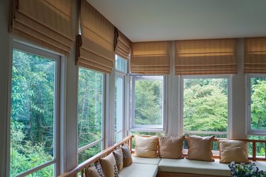 Roman shades in living room or enclosed porch