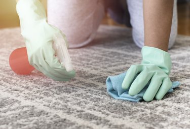 Removing a carpet stain.