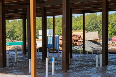 PVC drain pipes in the ground at a new house construction site.