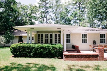 Backyard patio view of 1950’s style ranch house