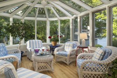 Conservatory interior in home with wicker accents