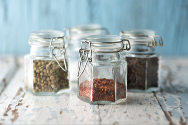 Spices in sealed glass jars.