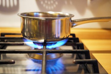 Stainless steel pan on gas stove