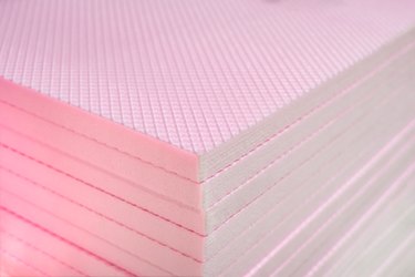 Pink Extruded Polystyrene XPS Foam Thermal Insulation Boards Stacked at Construction Site