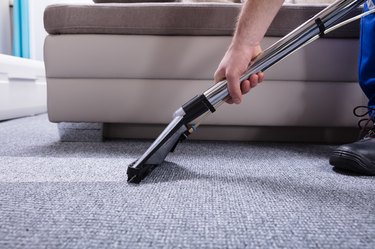Janitor Cleaning Carpet