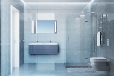 Gray modern shower room in daylight.