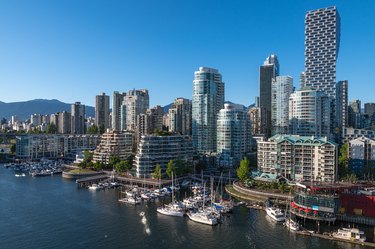 Sailboats and modern architecture in Vancouver, Canada