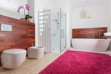 Red carpet in bright bathroom