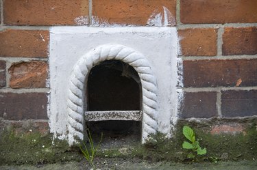 Traditional white-painted boot scraper, found outside doors of houses built in the 18th, 19th, and early 20th centuries.