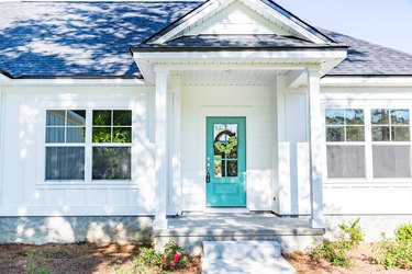 Exterior facade of a white new construction house