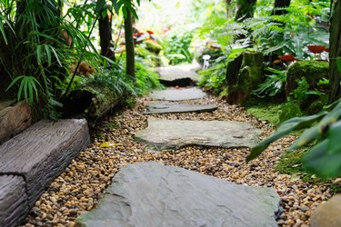 Stone walkway in garden step stone in gravel