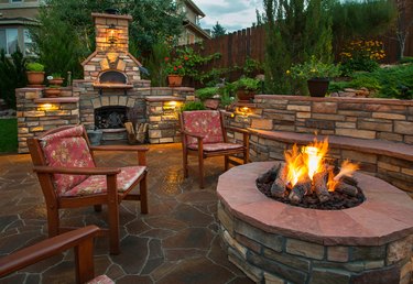 Backyard with firepit and pizza oven.