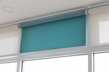 Green and white roller blinds.