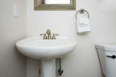 White bathroom pedestal sink