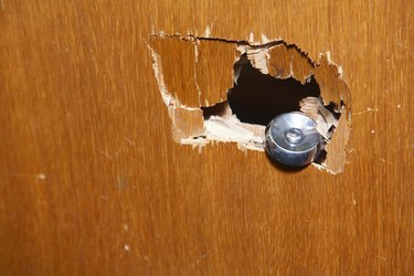 Broken doorknob after burglary