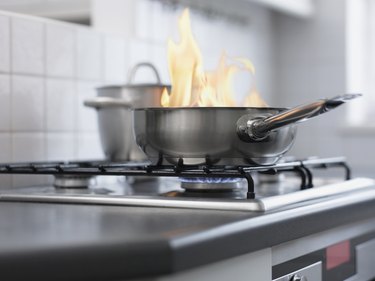 Food burning in pan on stove