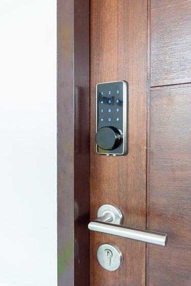 Electronic door lock security systems with key pads open by password number.