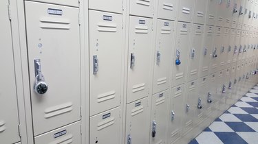 School lockers off white, black and white tile floor