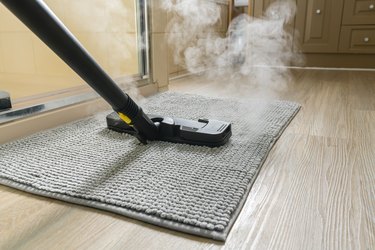 Cleaning bathroom mat using steam cleaner