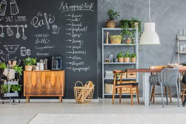 Kitchen and dining room with chalkboard wall.
