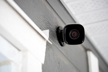 Black cctv outside building, home security system