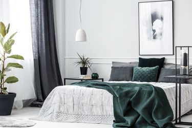 Elegant bedroom interior with green, gray, and white