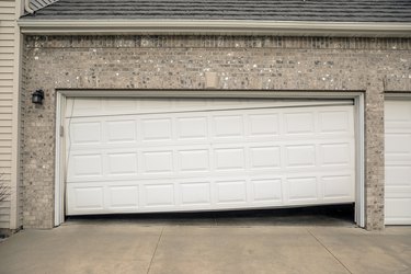 Broken Two Car Residential Garage Door