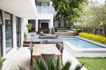 Modern patio next to swimming pool
