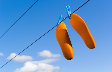 Orange Insoles Drying On Clothesline