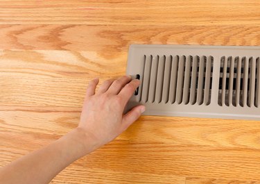 Opening up floor vent.