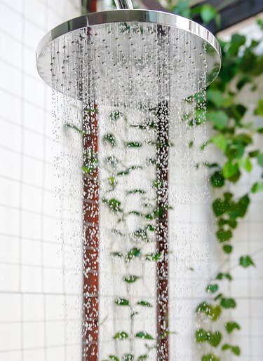 Outdoor shower head with running water