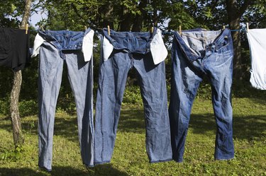 Jeans hanging on a clothesline.