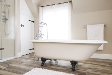 Clawfoot bathtub in luxury bathroom.