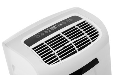 Portable air conditioner or dehumidifier isolated on white background