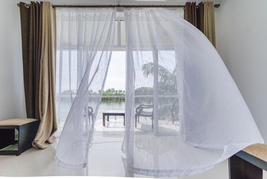 How to Keep Drapes From Sliding Closed on the Rod Hunker