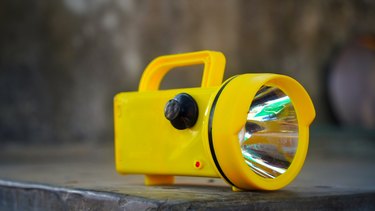 Electronic Super Bright LED Flashlight with yellow color for Emergency Traffic or Parking Arrangement Tools.