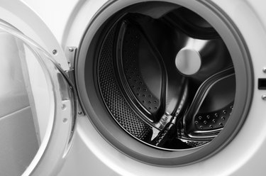 Close-Up Of Washing Machine At Home