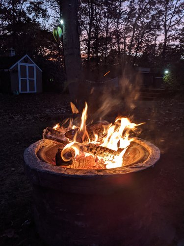 Outdoor fire pit with blazing flames