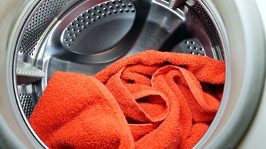 Orange Towel In Washing Machine