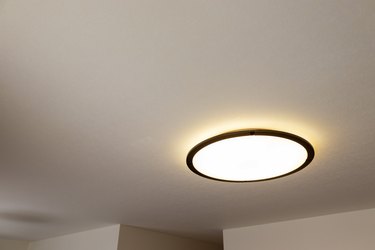 Round fluorescent store light fixture